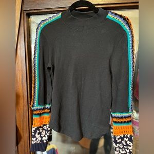 Grt condition. Free People. Sleeves are crochet & waffle knit. Body waffle knit